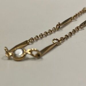 Faux gold and diamond chain with screwback enclosure